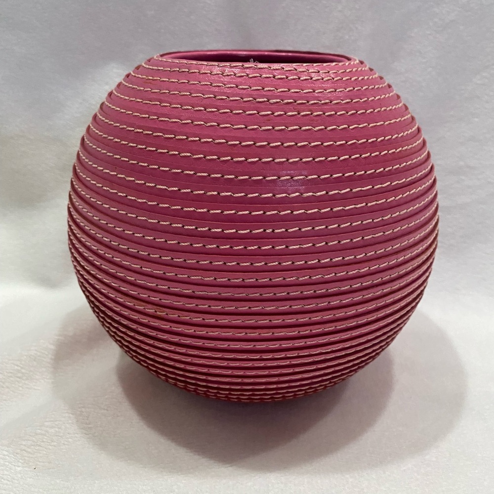 Crate and barrel pink round leather vase 5 1/2 inches tall 6 inches wide